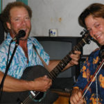 Mitch Rolling on guitar and Johnny Dunn on fiddle